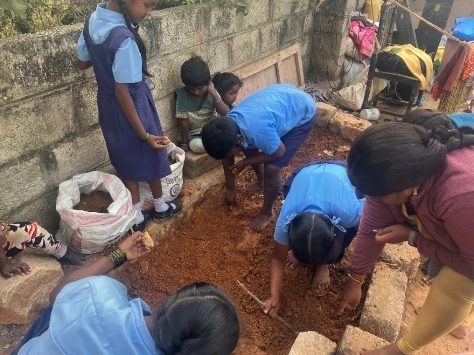 Children kitchen garden vegetables school India